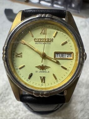 Citizen Light Green Dial Dress Watch with Gold Accents